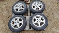 (4) 185/ 65 R14 Tires on Rims