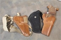 (2) Leather  Holsters and (1) Nylon Holster