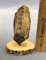 3" fossilized tooth scrimmed with a sailing ship m