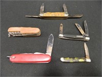 4 pocket knives - 1 multi-use tool