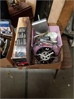 Box of portable air compressor and Sims games