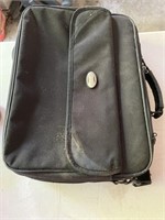 Laptop bag, blank discs, desk lamp, wooden round