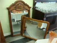 Two decorative mirrors.