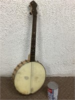 Instrument guitare banjo à 4 cordes