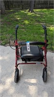 WALKER WITH SEAT, STORAGE, AND BREAKS