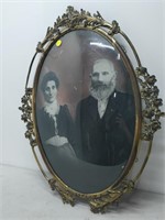 antique brass picture frame with old photo