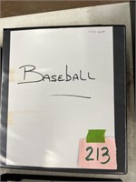 Baseball cards in binder