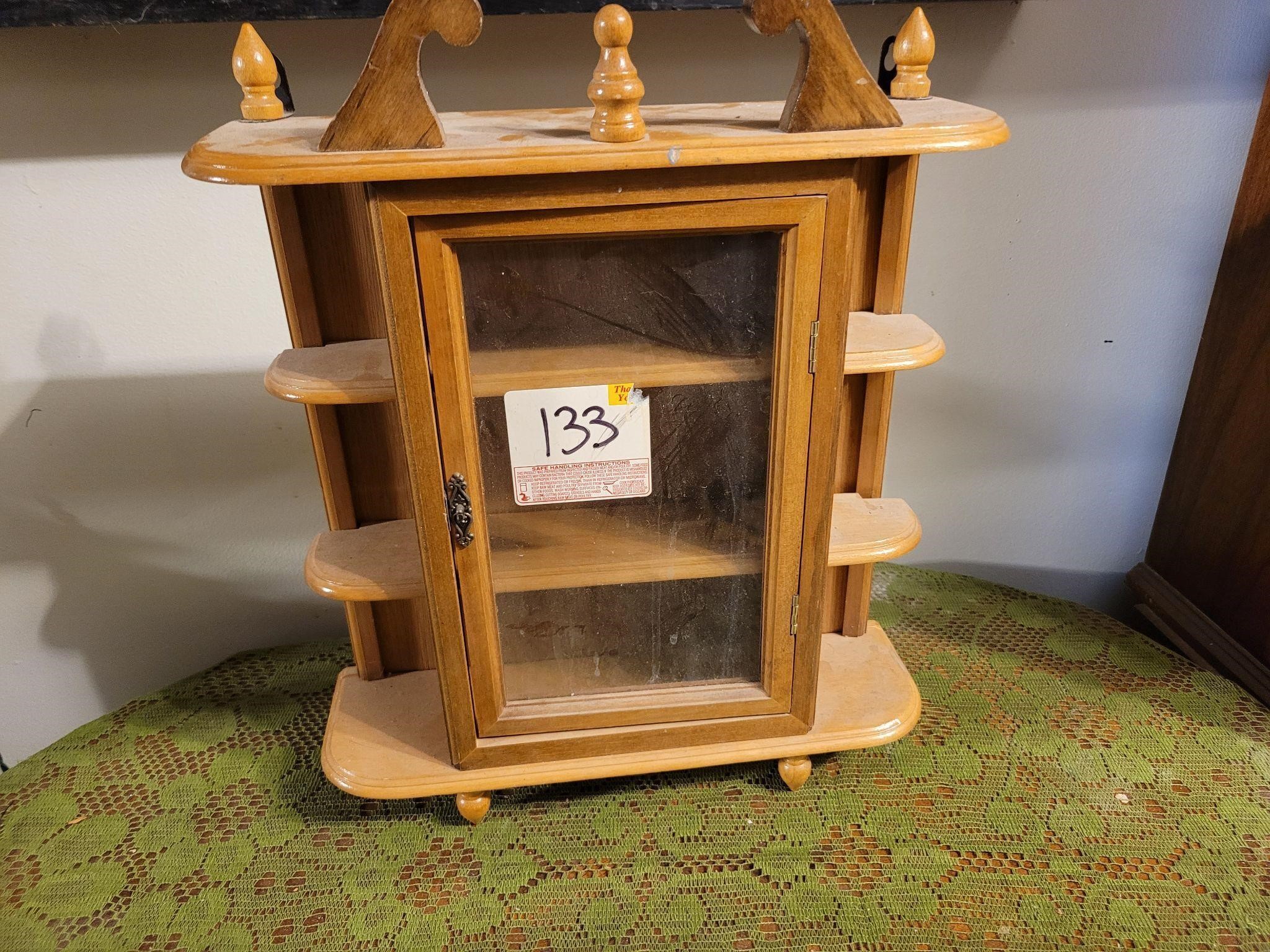 Small trinket cabinet with glass door