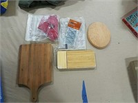 Kitchen items including a wooden cutting board