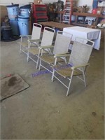 4 folding deck chairs.