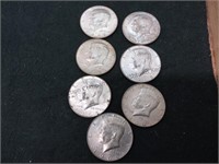 Seven silver clad half dollars for the 1960s for