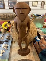 Carved wood man statue