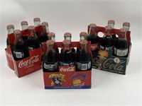 Assortment of Coca-Cola bottles unopened