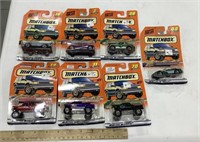 7 Matchbox cars in packages