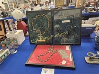 THREE ANTIQUE TRADE NECKLACES IN DISPLAY CASES