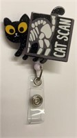 Cat Scan badge reel, black cat with a touch of