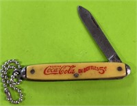 Coca-Cola advertising bucket knife