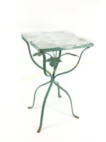 Metal patio table with glass