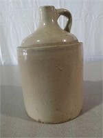 1 gallon bottle marked Red Wing stoneware jug.
