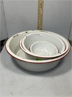 4 Red and White Enamel ware graduating bowls inclu