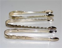 Three various Georgian sterling silver sugar nips
