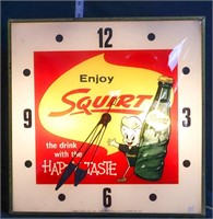 Vintage Squirt electric adv clock, works
