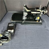 Singer Featherweight sewing machine.