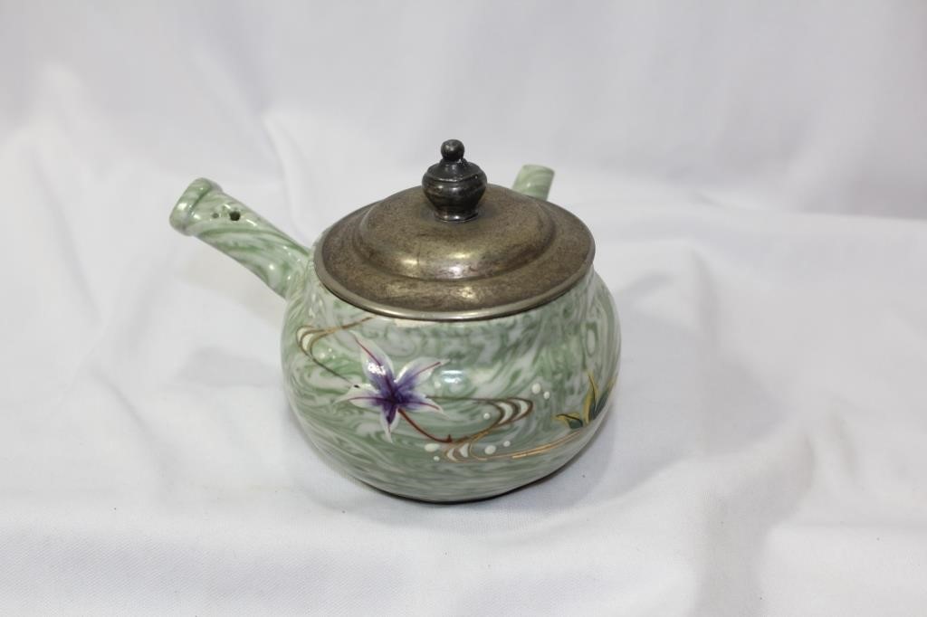 A Ceramic Oriental Tepot?