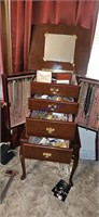 Standing jewelry box and contents 
37" tall