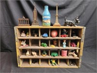 Vintage crate with misc figurines
