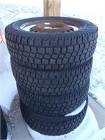 SET OF 4 AVALANCHE 235/65 R17 SNOW TIRES ON RIMS