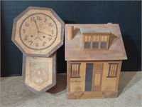 2 wooden folk art banks. House is marked Colorado