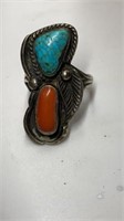 Turquoise and orange stone ring marked ‘SK’ size