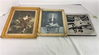 Three hanging home decor pieces. One is a framed
