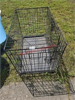 Medium/Large Dog Crate  (back yard)