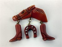 Bakelite horse brooch with cowboy boots &