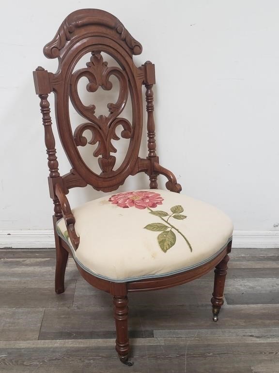 Victorian-style carved wood chair