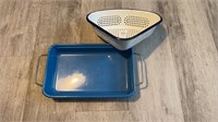 Enamelware colander and a baking dish