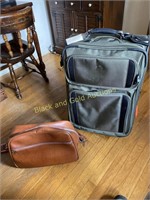 Large rolling suitcase plus duffel bag