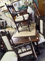 ORNATE CARVED DINNER TABLE W/ 6 CHAIRS