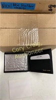 12 New Black Leather wallets in sealed box