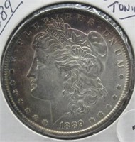 1889 UNC Morgan Silver Dollar with Toning.