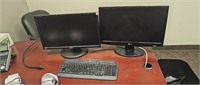 Two monitors and a keyboard