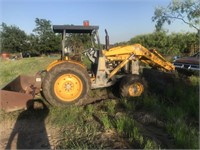 Case backhoe with box blade runs and drives