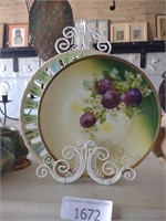 (2) decorative plates, one stand