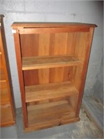 wooden book shelf .