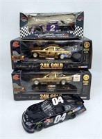 (4) 1:24 scale NASCAR Model Cars - Jimmy Johnson +