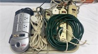 Tray of Surge Protectors & Extension Cords