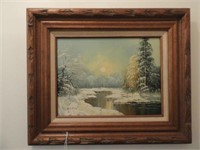 Framed oil on canvas of creek winter scene