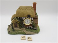 SMALL DECORATIVE COTTAGE WITH CLOCK